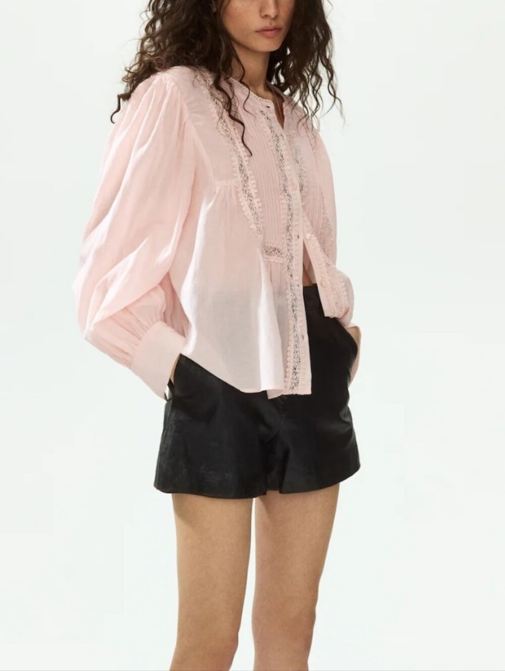 H&M light pink blouse with a relaxed, billowy fit